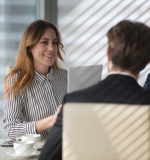 Professional woman in a meeting about cybersecurity